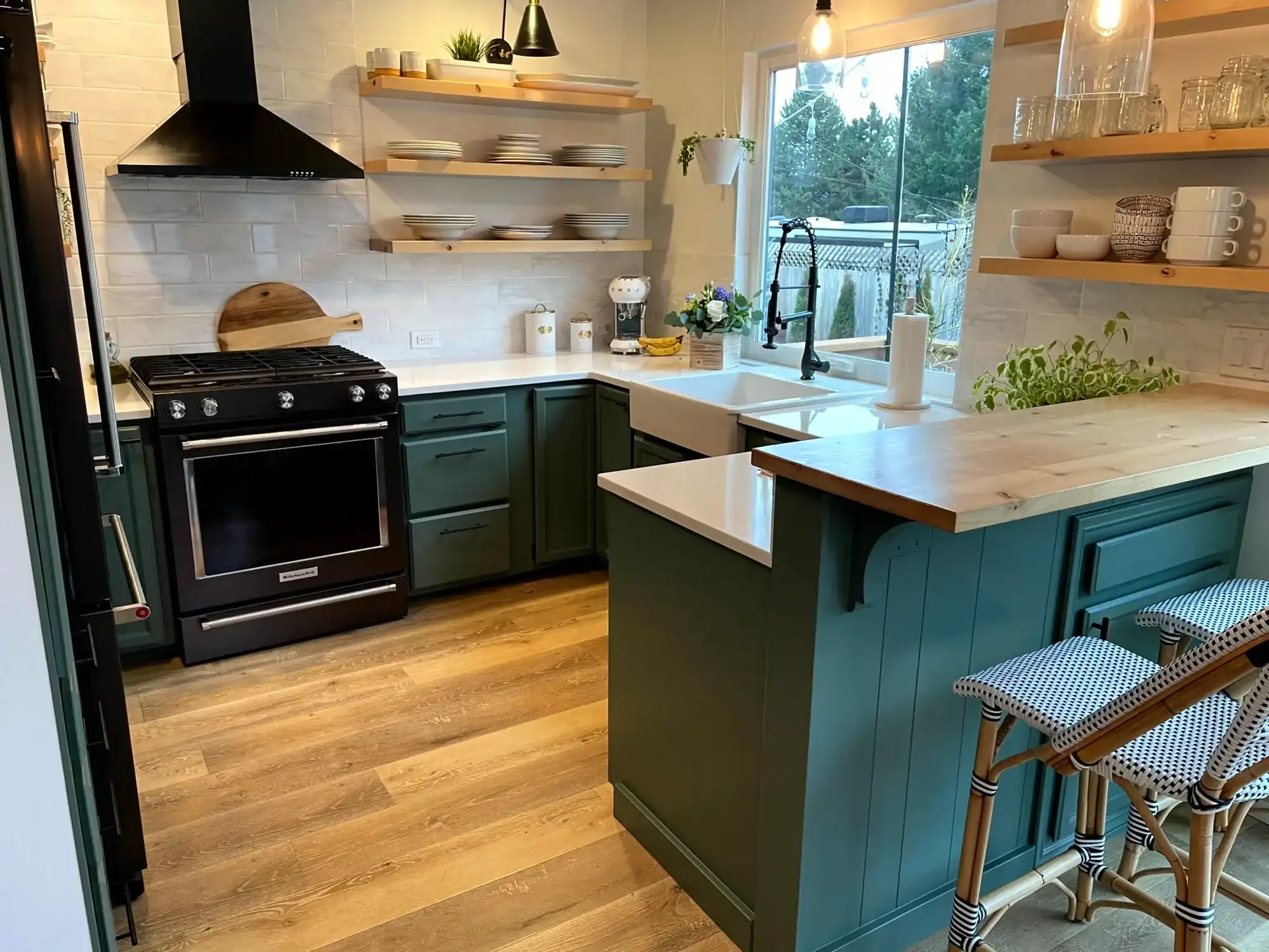 Copy of IMG_3964 Kitchen cabinets painted in deep hunter green with a teal island