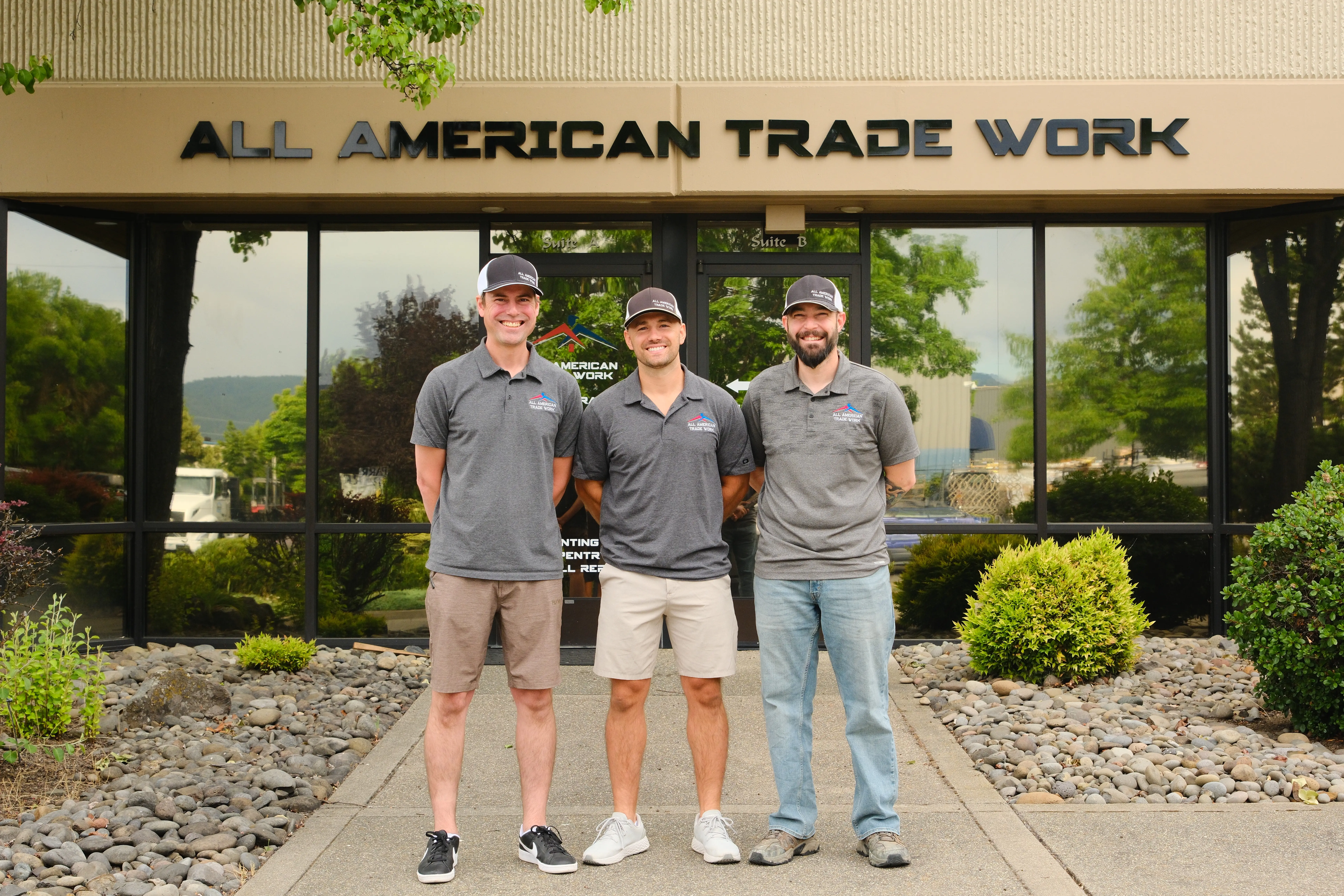 All American Trade Work Painting Professionals Three smiling men from All American Trade Work, a trusted painting and home services company.